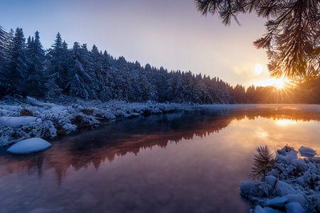 Beautiful Winter Landscape with Pine Forest and Sunset Reflections in the Lakeの素材