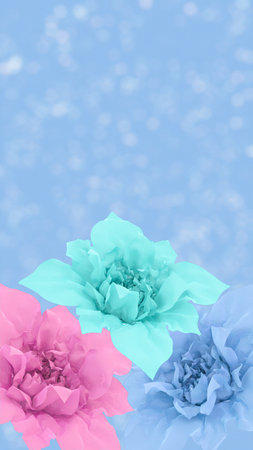 Enchanting floral composition featuring three pastel-colored flowers set against a light blue background adorned with glitter and bokeh effectsの写真素材