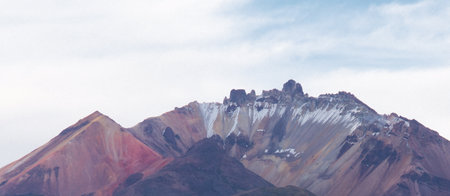 The imposing Tunupa Volcano with its colorful slopes