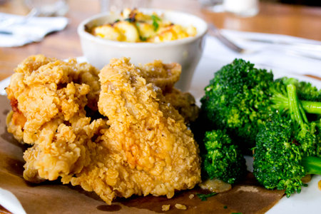 Breaded Crispy Fried Chicken with Broccoli.の写真素材