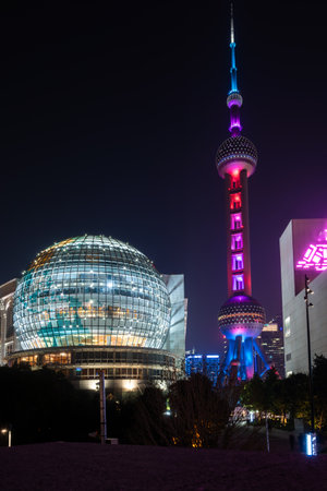 Oriental Pearl TV Tower lit up at night in Shanghai, China.