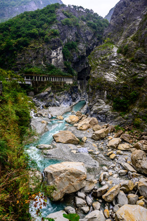 Emerald rivers and towering cliffs of Swallow Grotto and Yanzikou Trail in Taroko National Park, Taiwanの写真素材