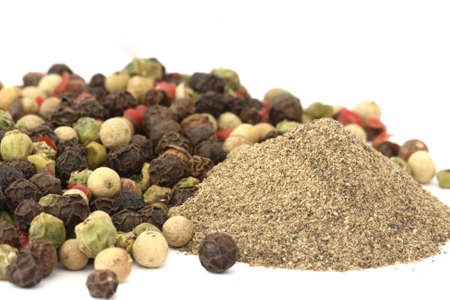 Pepper corn - red, white and black - whole and crushedの写真素材