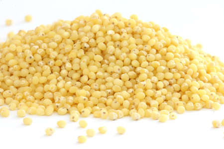Millet scattered on white background close up viewの写真素材