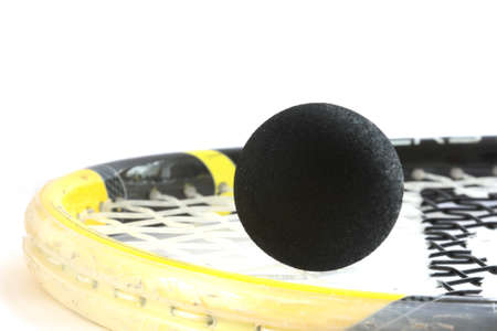 Squash rocket with two-yeallow dotted black ball の写真素材
