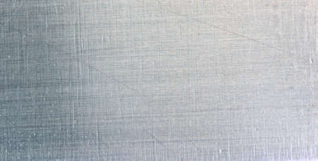 Detail view of silver scratched metal surface