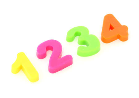 Numbers formed from plastic colourful toy digits on white backgroundの写真素材