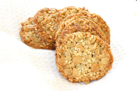 Stack of whole grain biscuits on white backgroundの写真素材