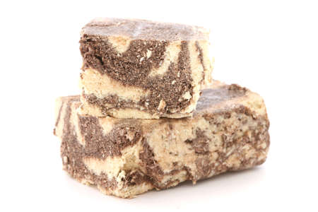 Typical Greek cacao halva dessert cut into two piecesの写真素材