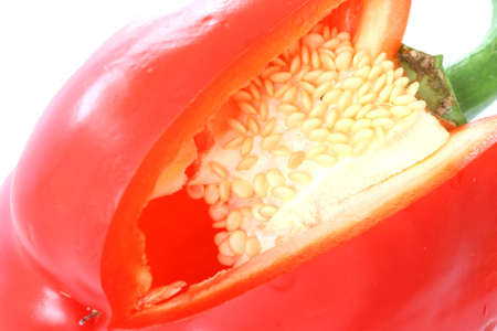 View of inside of a cut red pepper on a white backgroundの写真素材