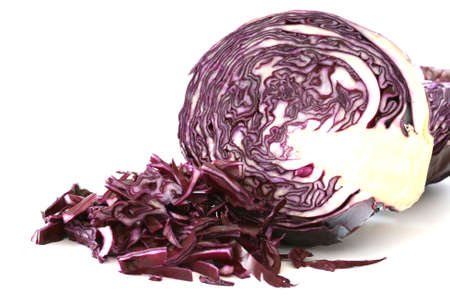 Raw red cabbage half and grated pieces on white backgroundの写真素材