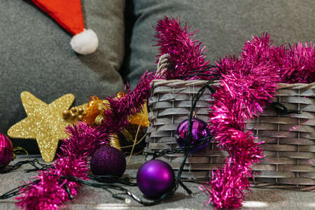 Christmas decoration in a basket, tree decoration, on blurred background.