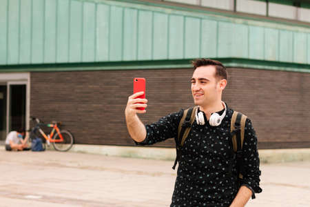 an attractive and young man taking a selfie. concept of lifestyle and communication in social...
