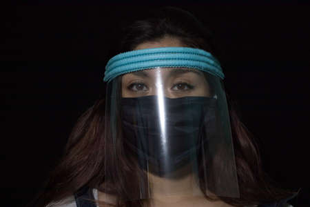Woman with virus security equipmentの写真素材