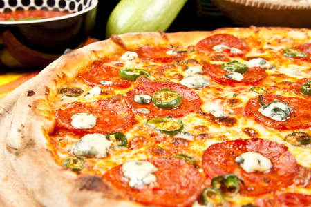 Pizza with salami and blue cheeseの写真素材