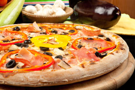 Pizza and vegetablesの写真素材
