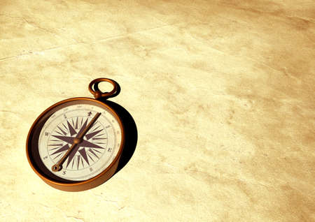 Old compass on old paperの写真素材