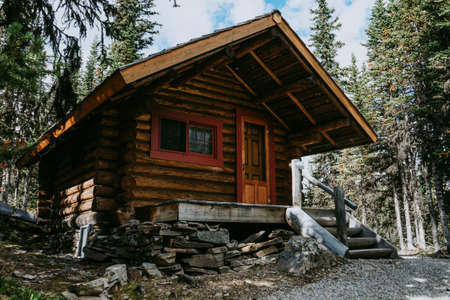 Cozy wooden cabin on shore of Lake Ohara in Yoho National Park, Canadian Rockies. Tourist/hikers summer accommodation in the mountains. Beautiful British Columbia, Canadaのeditorial素材