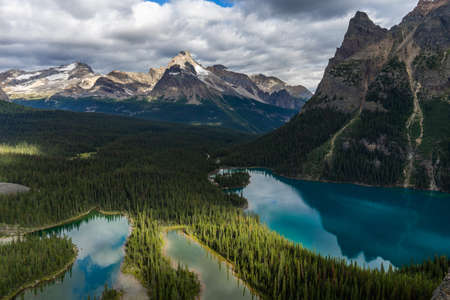 Iconic scenic landscape view of beautiful Lake Ohara and Marry Lake from the summit of THE OPABIN PLATEAU trail, Yoho National Park, British Columbia, Canadaのeditorial素材