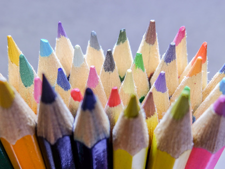 A handful of colored pencils waiting to be usedの写真素材