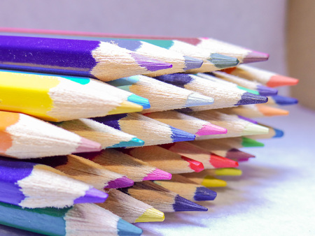 A handful of colored pencils waiting to be usedの写真素材