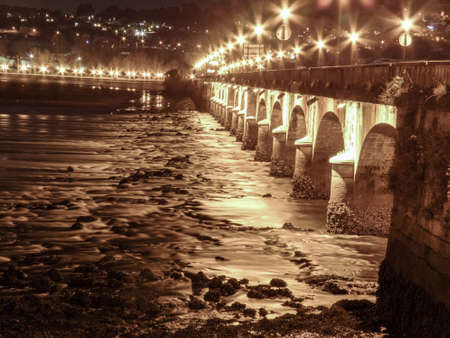 Image of a night at the bridge over the river Eume in Pontedeumeの写真素材