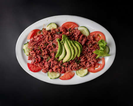 Mexican food, tuna salad, with cucumber, tomato and chiliの写真素材