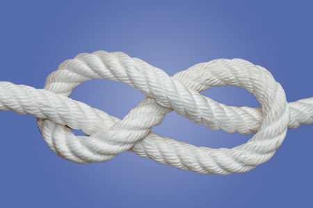 The figure-eight knot is a type of knot  It is very important in both sailing and rock climbing as a method of stopping ropes from running out of retaining devices の写真素材
