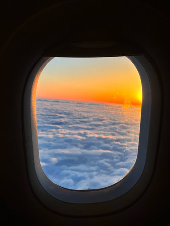 View from the porthole of the plane window during the flight