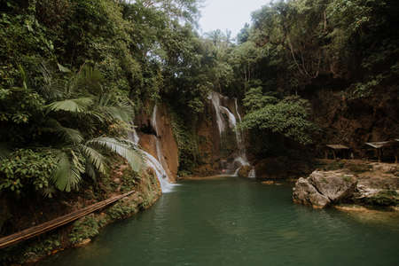 nature stamp with a beautiful waterfall on the island of bohol in the philippinesの写真素材
