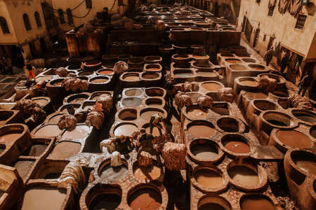 Tanneries of Fes, Morocco, AfricaOld tanks of the Fez's tanneries with color paint for leather, Morocco, Africaのeditorial素材