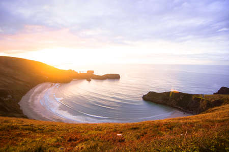 Sunset at Torimbia beach in Llanes Asturia. sunset beachの写真素材