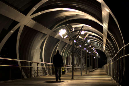 Arganzuela Bridge illuminated on a spring night and Madrid Rio Park, Madrid, Spainの写真素材