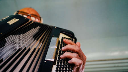 A man playing an accordion.の写真素材