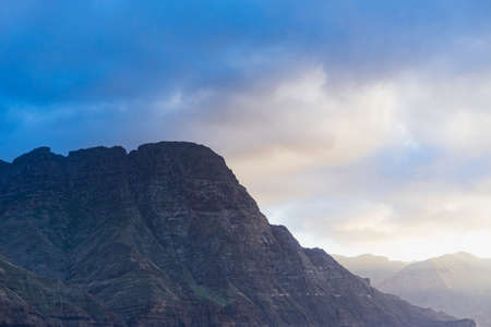 Blue mountain during sunsetの写真素材