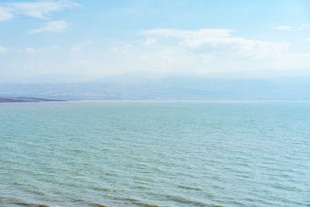 The dead sea in israel. No one is in the dead sea and it is a calm blue color.の写真素材