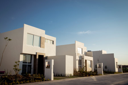 New modern houses perfect for living, sunny day and blue skyの写真素材