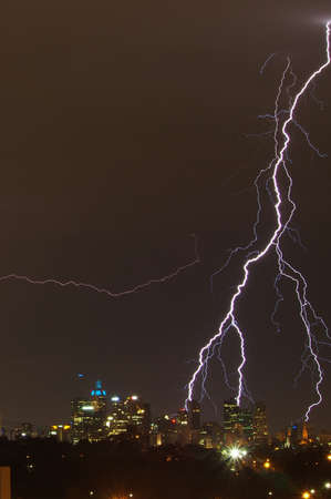 Lightning strikes over Melbourne city skylineの写真素材