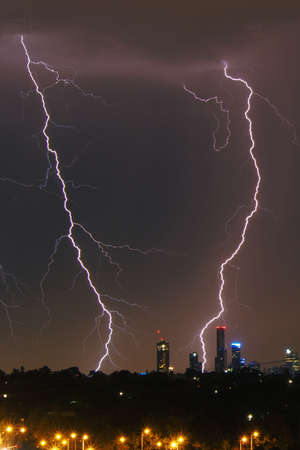Lightning strikes over Melbourne city skylineの写真素材