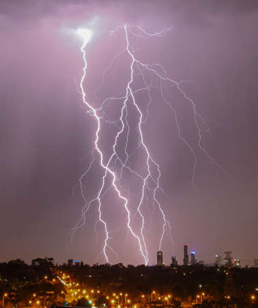 Lightning strikes over Melbourne city skylineの写真素材