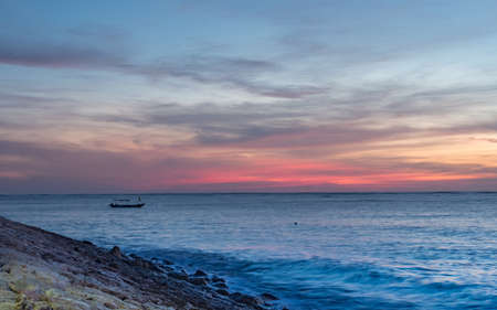 Traditional fishing boat on the beach in Bali Indonesia