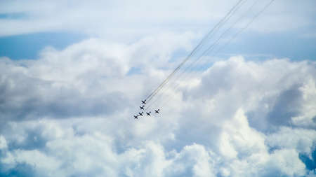 AUSTRALIA, MELBOURNE - MARCH 16, 2014: Plane exhibition in the sky amoungst the cloudsのeditorial素材