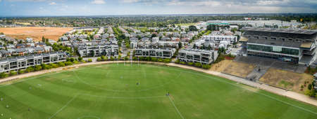 AUSTRALIA, MELBOURNE - FEBRUARY 25, 2018: Ricoh Centre at Waverley Park with the new housing estate surrounding the historic oval.のeditorial素材