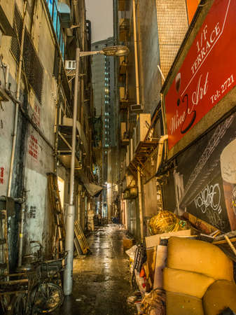 HONG KONG, KOWLOON - NOVEMBER 7, 2014: Back alley of Hong Kong at nightのeditorial素材