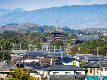 JAPAN, NARA - JANUARY 12, 2018: The Tower of Yakushiji temple and surrounding Nara Cityのeditorial素材