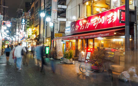 JAPAN, OSAKA - APRIL 11, 2017: Night time crowds of Osaka's popular Namba area. Busy with many...