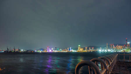 Cityscape of Kobe city, viewed acrossed the Port of Kobe at night, Japanの写真素材