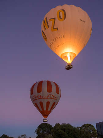 AUSTRALIA, MELBOURNE - APRIL 04, 2016: Hot Air Balloons taking off during early morning sunriseのeditorial素材