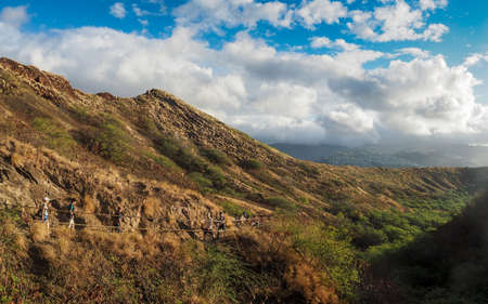 USA, HAWAII - SEPTEMBER 2, 2018: People hiking the trial that leads to the summit of Diamond Head in Honoluluのeditorial素材