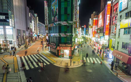 JAPAN, TOKYO - APRIL 19, 2019: Shinjuku nightlife with bright lights and endless crowds visiting the...
